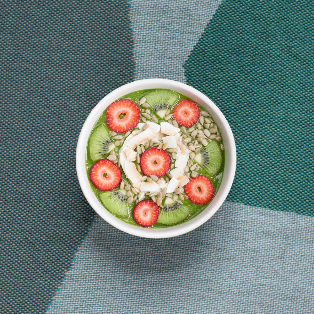 bowl of porridge with kiwi, top view